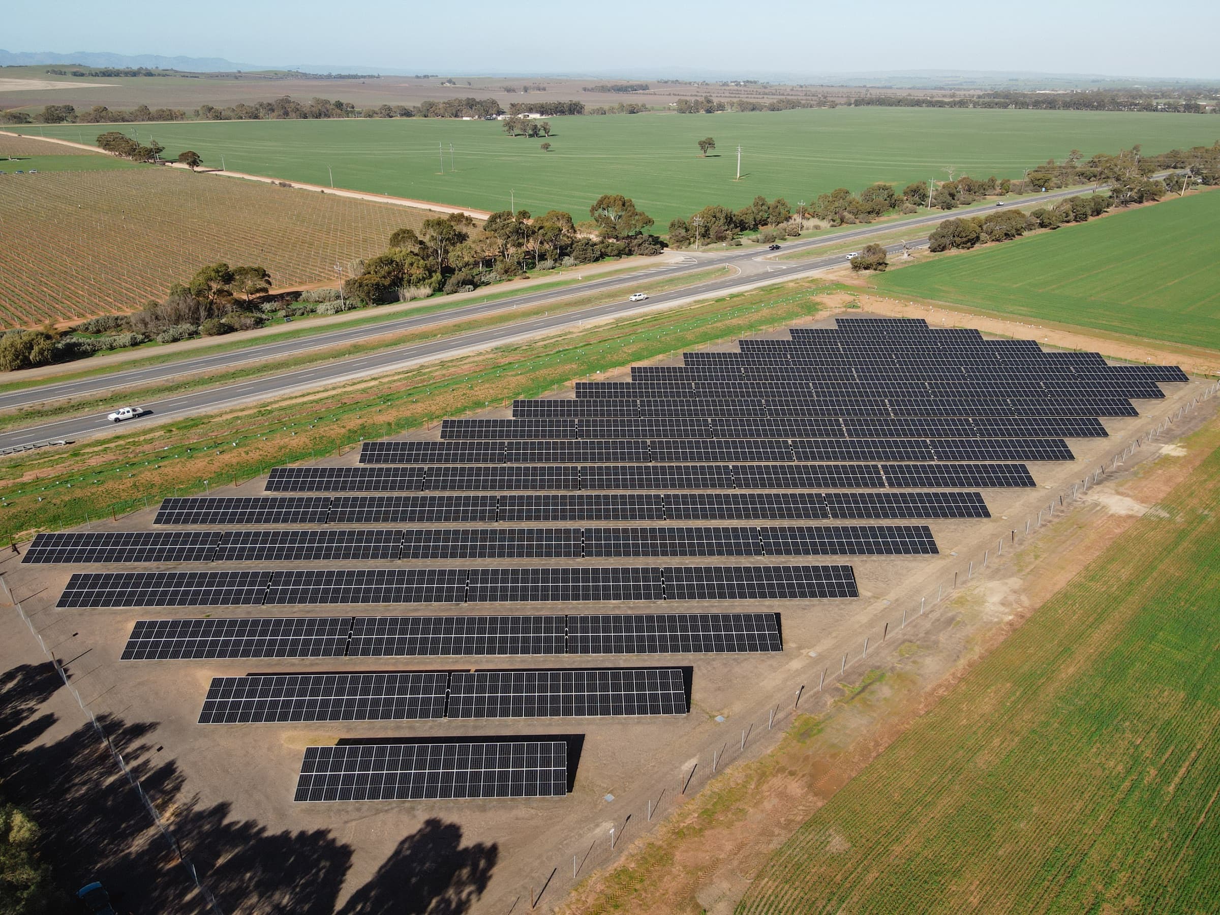 Aerial view of the Laucke Mills ground-mounted solar array beside the highway at Daveyston